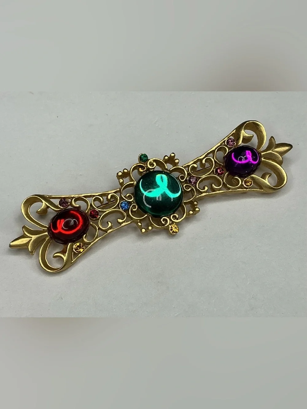 Gold-Tone Multigem Filigree Brooch with Green, Red and Purple Cabochons